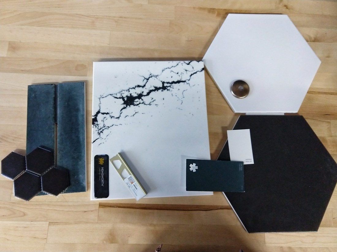 Material samples and finish selections laid out for a Dwellings design project